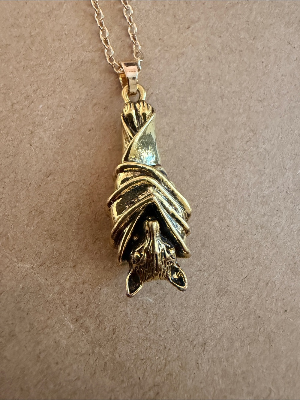 Gold Toned Finish Bat Wrap Pendant Necklace - Women Jewelry
